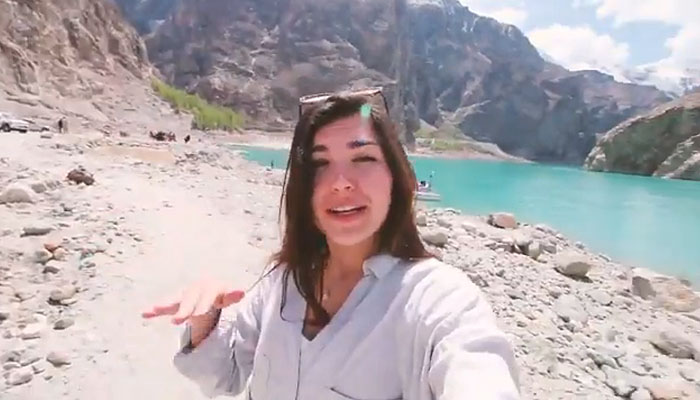 Female European traveler admires beauty of Gilgit-Baltistan
