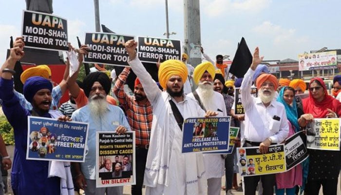 Anti-farmer reforms: Sikh community takes out rally against Indian govt