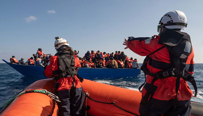 Hundreds of rescued migrants disembark in Sicily