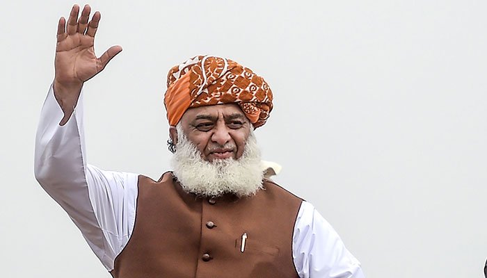 Maulana Fazl administers polio drops to children