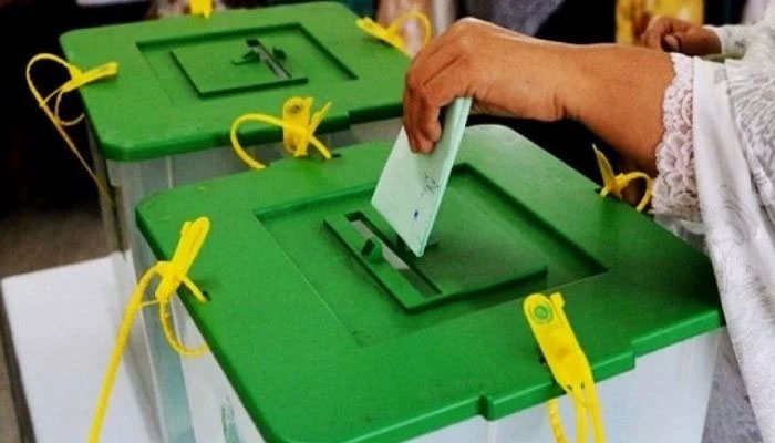 A woman can be seen casting her vote in this  file photo.