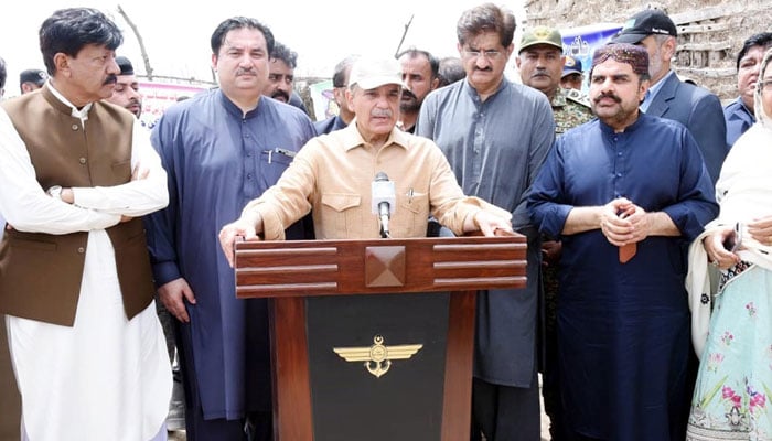 PM Shehbaz talking to media at a relief camp in the Gul Mohaamed Uplano village. PID