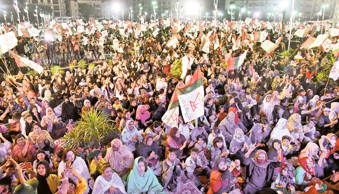 A large number of people are attending the Muttahida Qaumi Movement-Pakistan’s women’s convention at Nishtar Park on Sunday. — The News photo by Naqeeb Ur Rehman