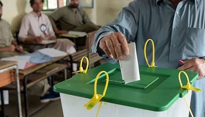 A man ballot casts his vote in a polling station. — AFP/File