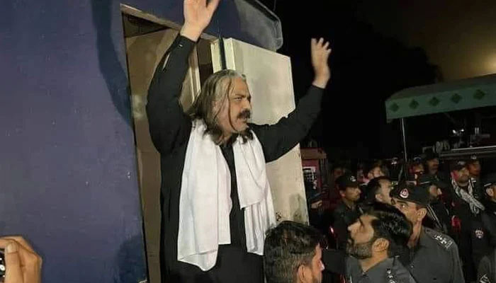 Police take Ali Amin Gandapur into custody in Dera Ismail Khan on March 6, 2023. — Twitter/@Jhagra