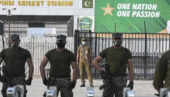 Paramilitary soldiers stand guard outside the Rawalpindi Cricket Stadium in Rawalpindi on September 17, 2021. — AFP