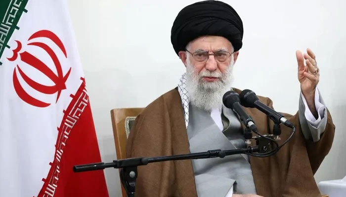 Supreme Leader Ayatollah Ali Khamenei speaks to an audience with the national flag of the Islamic Republic of Iran at his side. — AFP/Files