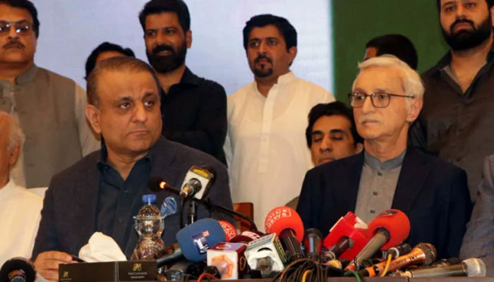 Jahangir Khan Tareen addresses a press conference alongside Aleem Khan and other leaders in Lahore on June 8, 2023. — PPI