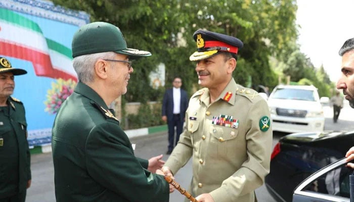 Iranian Chief of General Staff of Armed Forces Major General Mohammad Bagheri receiving Army chief General Syed Asim Munir. — ISPR