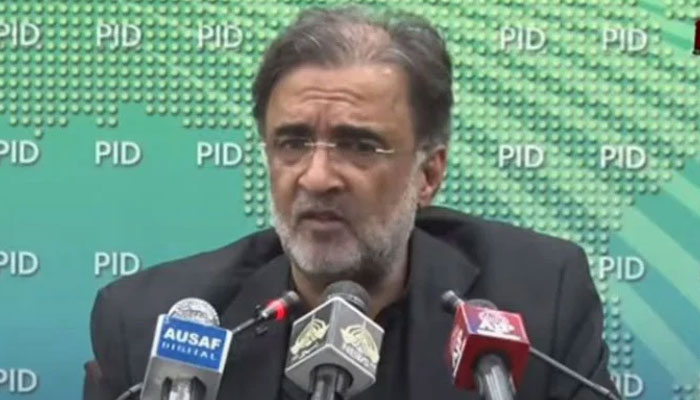 Adviser to the Prime Minister for Kashmir and Gilgit-Baltistan Qamar Zaman Kaira addressing a press conference in the federal capital. — Screengrab via YouTube/ PTV News Live