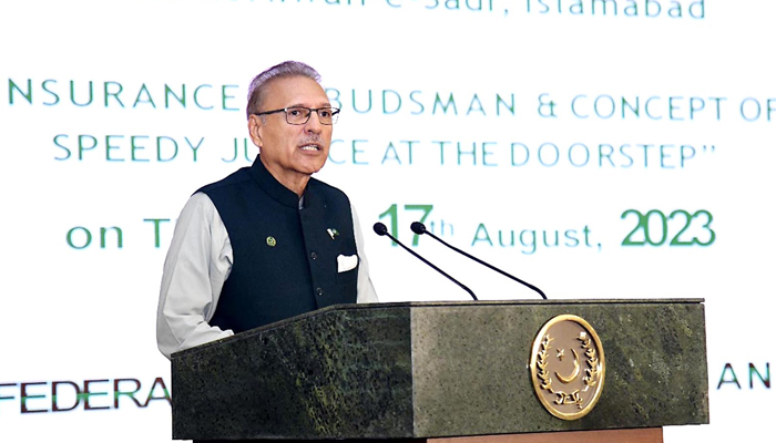 President Dr Arif Alvi addressing a seminar on Insurance Ombudsman and Concept of Speedy Justice at the Doorstep, at Aiwan-e-Sadr on August 17, 2023. — INP