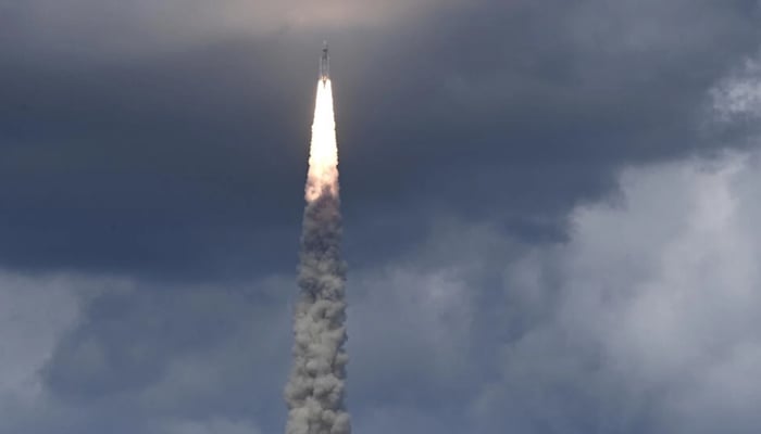 A rocket carrying Indias Chandrayaan-3 spacecraft lifts off on July 14, 2023. — AFP