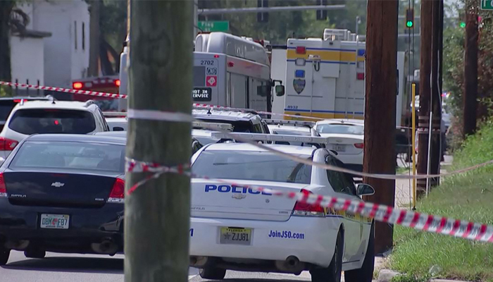 This video grab shows police cars on the site of a shooting in Jacksonville, Florida, on August 26, 2023.— AFP