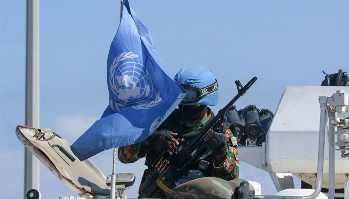 A UN peacekeeping force (UNIFIL) soldier at the Lebanese southern coastal area of Naqura, by the border with Israel. — AFp/File