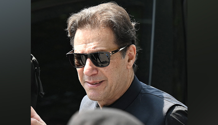 Pakistans former Prime Minister Imran Khan arrives to appear in the Supreme Court in Islamabad on July 24, 2023. — AFP