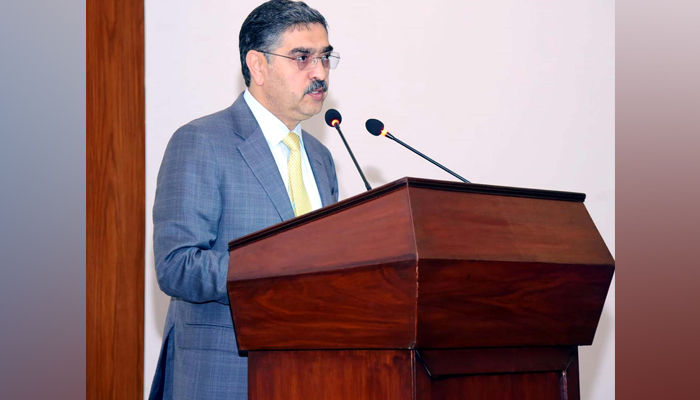 Caretaker Prime Minister Anwaar-ul-Haq Kakar addressing the debriefing session of Pakistan Navys War Game Shamsheer-e-Bahar IX on August 30, 2023. — APP