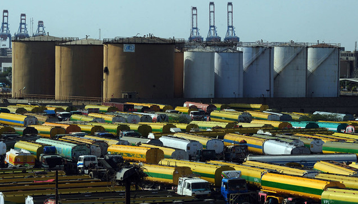 In this photo, an overview shows tankers parked outside a local oil refinery in Pakistans port city of Karachi.  AFP/File