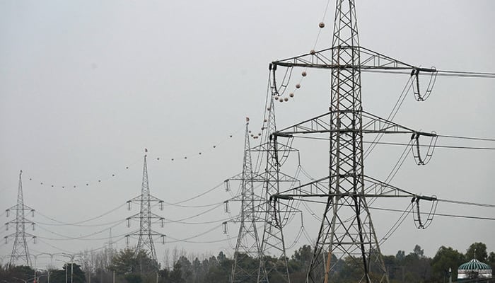 A general view of the high voltage lines during a nationwide power outage in Rawalpindi on January 23, 2023. — AFP