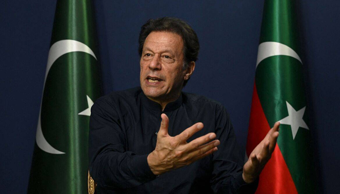 Former prime minister and Chairman of Pakistan Tehreek-e-Insaf (PTI) Imran Khan while speaking with the media. — AFP/File