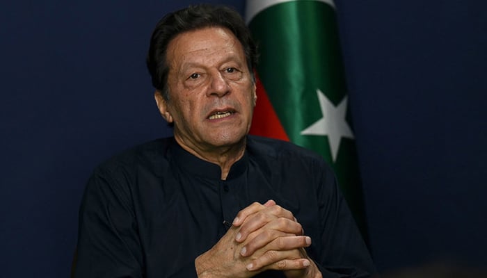 Former Pakistans Prime Minister Imran Khan speaks during an interview with AFP at his residence in Lahore on May 18, 2023. — AFP