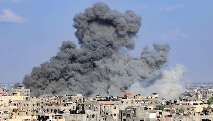 Smoke billows during an Israeli air strike in Rafah in the southern Gaza Strip on October 11, 2023. — AFP