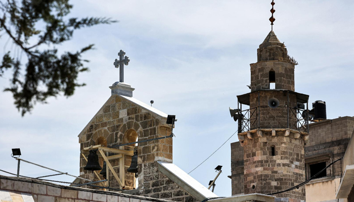 This representational picture taken on May 30, 2021 shows a view of (L to R) the bell gable of the Greek Orthodox Church of Saint Porphyrius. — AFP