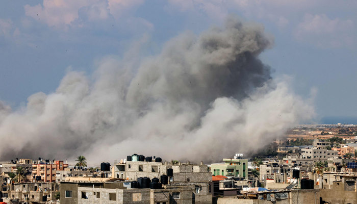 Smoke billows after Israeli shelling on the southern Lebanese border village of Dhaira on October 16, 2023. — AFP