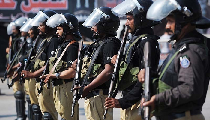 Police personnel can be seen standing guard. — AFP/File