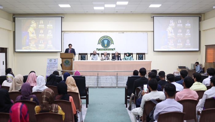 A book launching ceremony on October 19, 2023, can be seen taking place in this picture with the authors of the book sitting on the stage at the University of Education.— Facebook/University of Education