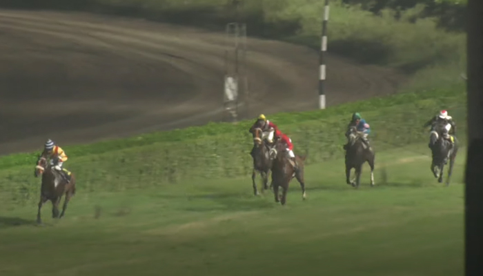 This screengrab taken from a video released on August 21, 2023, shows people racing with their horses. — YouTube/Pakistan Horse Racing
