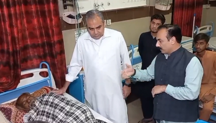 Chief Minister Mohsin Naqvi listened during a visit to patients at DHQ Okara, in this still taken from a video released on October 24, 2023. — X/@MohsinnaqviC42