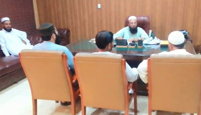 Mufti Tila Muhammad, Mayor/Chairman Tehsil Badbher (JUI-F) while meeting people in his office in this picture released on September 1, 2023. — Facebook/Mufti Tila Muhammad Official