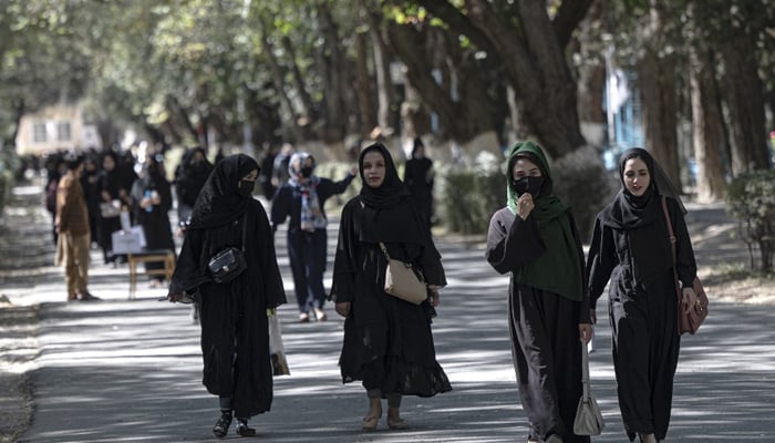 This photo taken on October 13, 2022, shows Afghan female students arriving for entrance exams at Kabul University in Kabul. — AFP/File