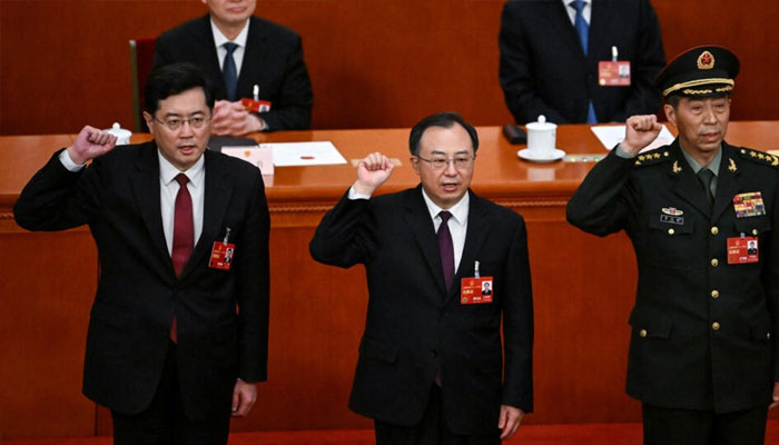 Former foreign minister Qin Gang (L) and defence minister Li Shangfu (R) have both been ousted from Chinas State Council, or cabinet, with Li also losing his defence portfolio. AFP/File