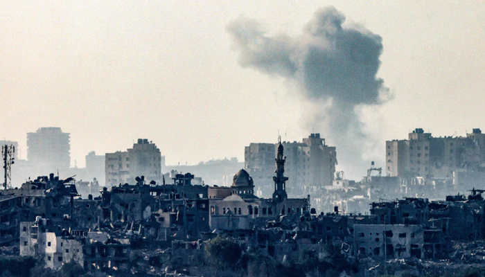 A picture taken from the southern Israeli city of Sderot on October 25, 2023, shows smoke ascending over the northern Gaza Strip following an Israeli strike. — AFP