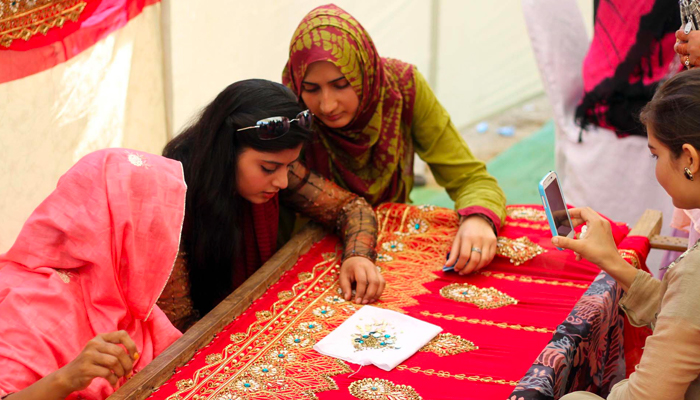 Women workers seen learning how to embroider. — PPI/File