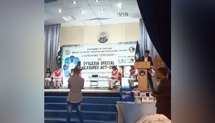 This screengrab taken from a video released on October 26, 2023, shows students on the stage during a launching ceremony for the Dyslexia Bill in Islamabad. — Facebook/Ministry of Federal Education and Professional Training Pakistan