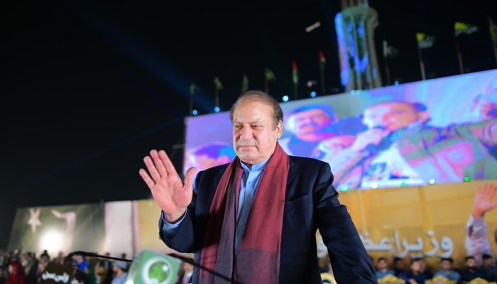 Former Prime Minister and PMLN supremo Nawaz Sharif waves at his supporters after returning to Pakistan after four years of exile on October 21, 2023. — X/@pmlndigitalpk