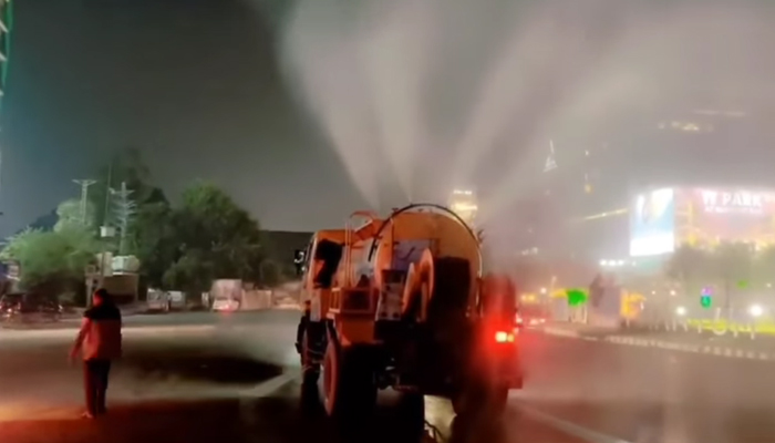 This screengrab, taken from a video released on October 28, 2023, shows an anti-smog vehicle named Mist Queen spraying. — Facebook/WASA LDA