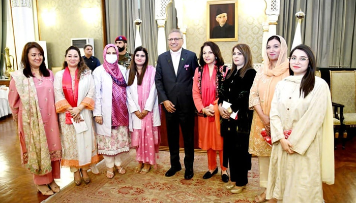 MIH officials with the President of Pakistan Dr Arif Alvi at the Aiwan-e-Sadar during one of the Breast Cancer Awareness events in this picture released on October 25, 2023. — Facebook/Maroof International Hospital