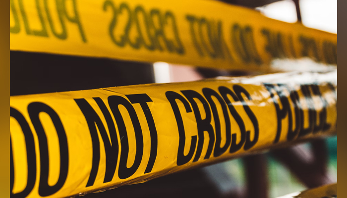 A representational image shows a police tape. — Unsplash