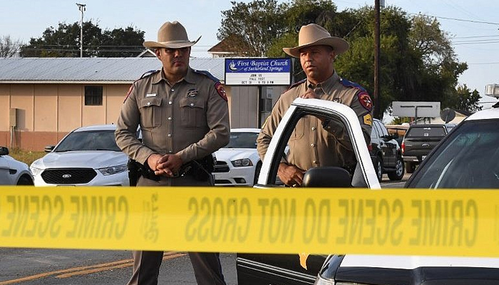 Texas police personnel guard the entrance to the First Baptist Church. — AFP/File