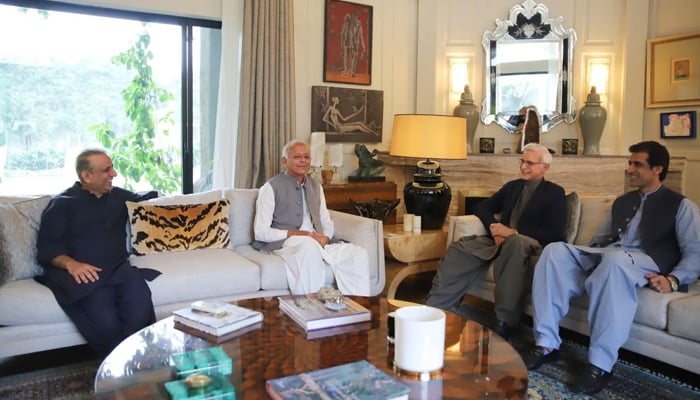 Former minister and PTI leader Ghulam Sarwar Khan (c) while meeting with the leaders of the IPP Jahangir Tareen (R), Aleem Khan (L) and Awn Chaudhry (2nd-R) on October 31, 2023. — Facebook/Istehkam e Pakistan Party