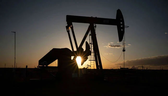 In this file photo taken on April 23, 2020 Pump jacks operate near Loco Hills in Eddy County, New Mexico. — AFP