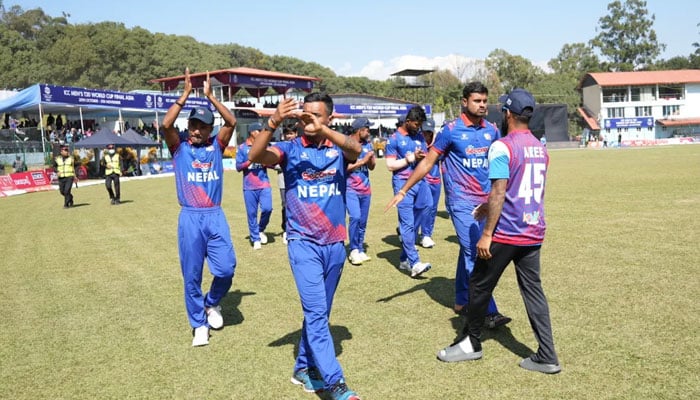 The Nepal players greet the crowd after qualifying for the semi-finals. — ICC