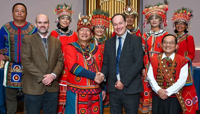 Pan Chuang-Chih, the mayor of Mudan, and Gavin McLachlan (right), from the University of Edinburgh mark the return of the skulls. — University of Edinburgh