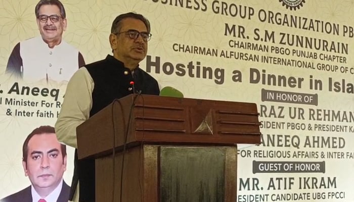 Minister for Religious Affairs Aneeq Ahmed, speaks during a dinner reception, organized by the Pakistan Business Group Organization (PBGO) Punjab Chapter in this still on November 9, 2023. — Facebook/Ministry of Religious Affairs & Interfaith Harmony, Pakistan