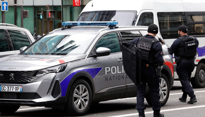 French police officers at a metro station after a woman making threats on an RER train was shot and wounded by police, in Paris, October 31, 2023. — AFP