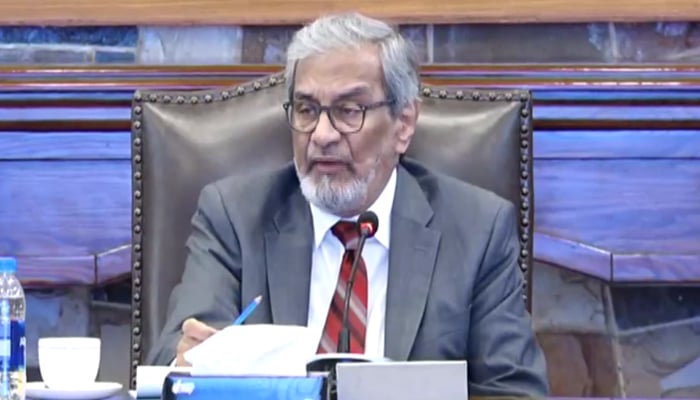 This still shows caretaker chief minister Justice (retd) Maqbool Baqar chairing a meeting at the CM House on November 13, 2023. — Facebook/Sindh Government