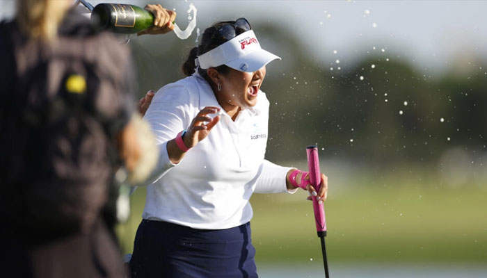 American Lilia Vu gets a champagne shower after her victory in the LPGAs The Annika tournament in Belleaire, Florida. — AFP